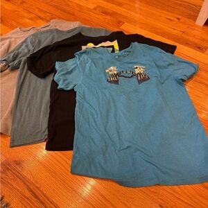 Boys YXL Under Armour shirts. Four shirts total. Three short sleeve, one long.